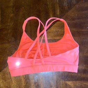 Pink Lululemon sports bra